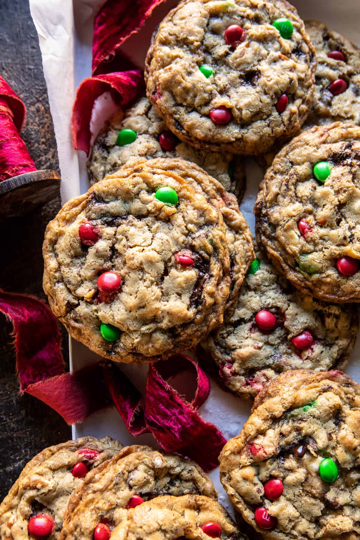 Close-up photo of perfectly baked monster cookies with red and green M&Ms